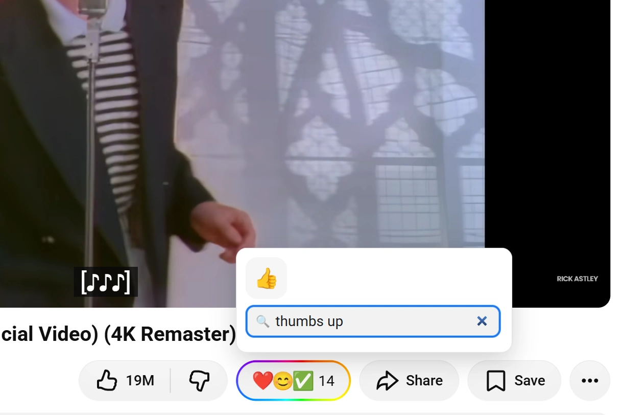 Searching the picker for "thumbs up" and hovering the 👍 reaction, about to add it